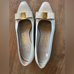 Salvatore Ferragamo Cream Quilted Flats with Gold Bow Accent